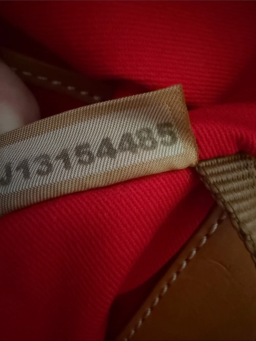Dooney & Bourke Tote with Tan Leather Straps and Grommet Details